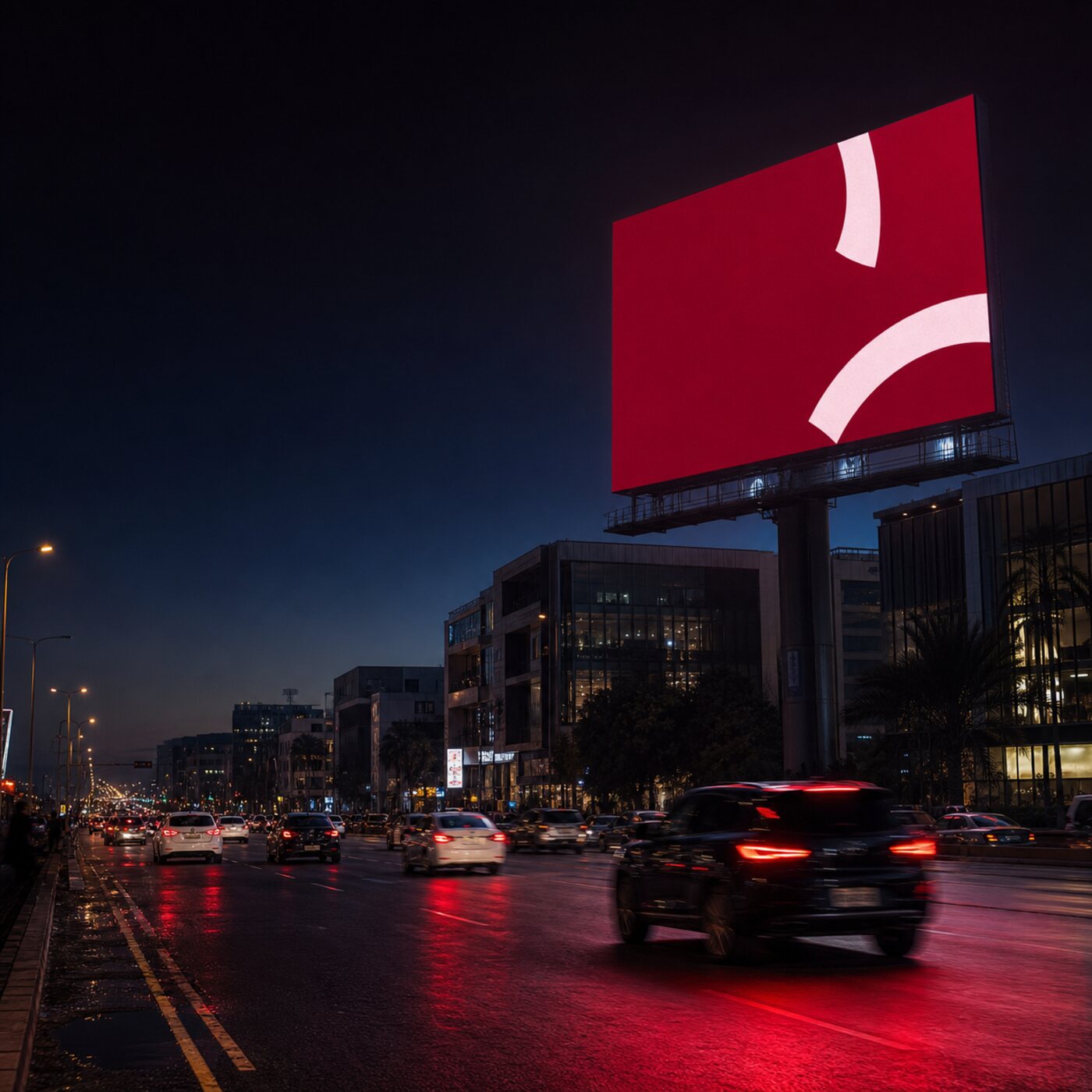 Digital SMD screen advertising on a Lahore commercial corridor at dusk